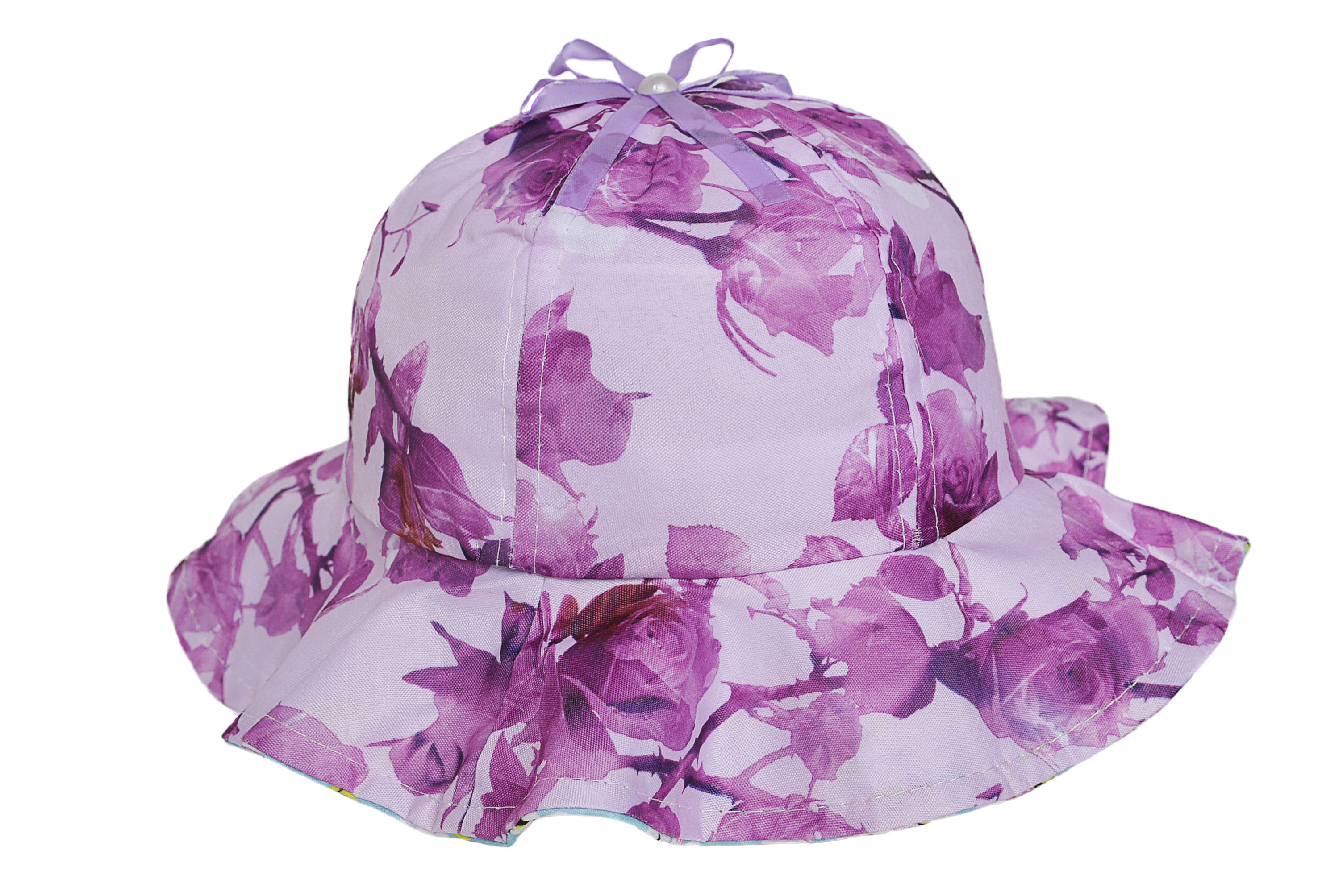 Sombrero capelina de niña en tela floreado. 