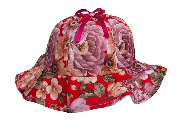 Sombrero capelina de niña estampado floreado.